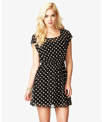 Vestido topos con blonda 25,59€